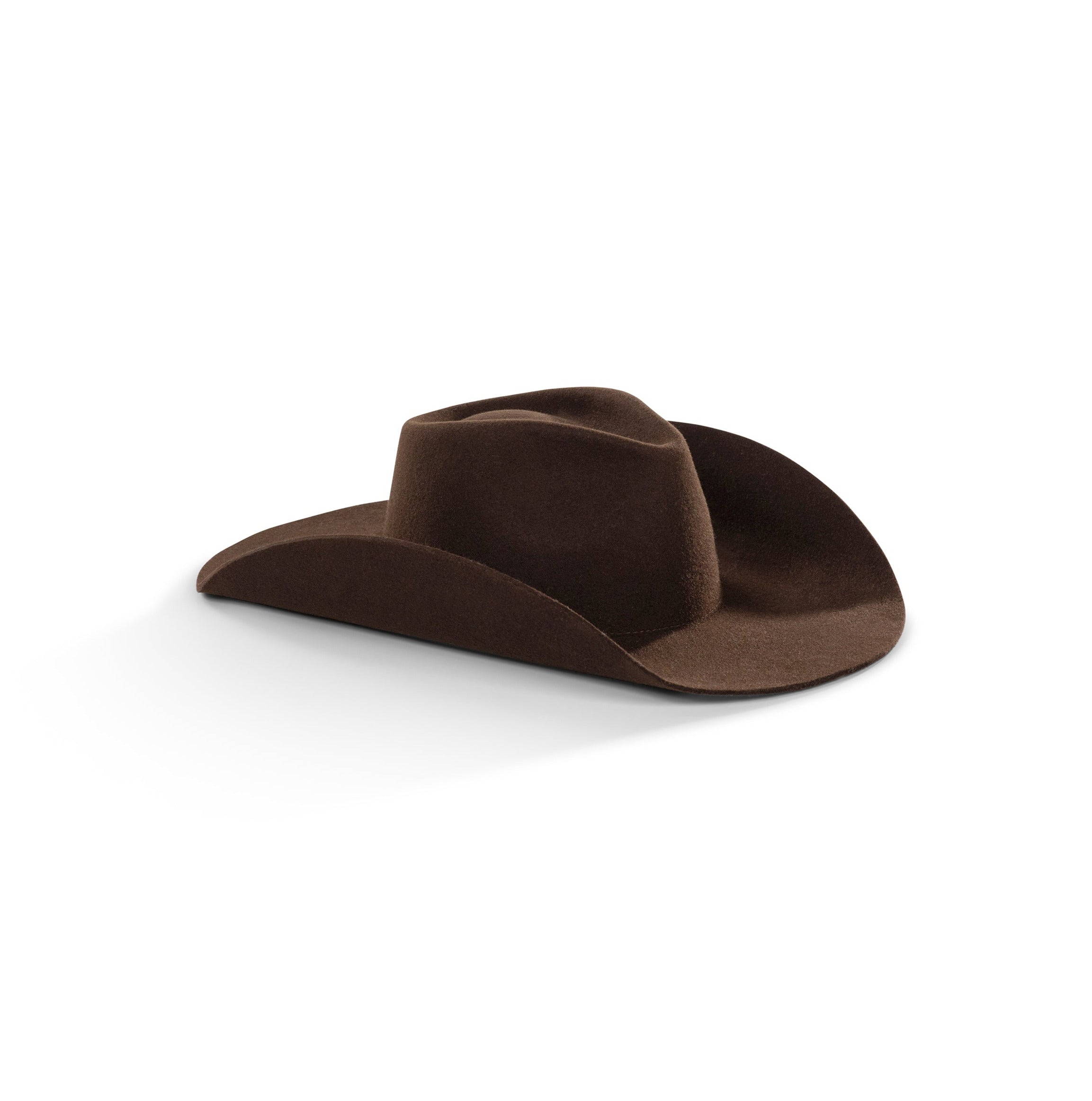 The Rodeo Smokey Brown Cowboy Hat is a fedora hat with western vibes. Channel your inner cowboy with this traditional cowboy hat. The Cowboy Hat is the perfect hat to wear to channel western vibes. The Rodeo Collection is perfect to channel your western vibes at a music festival in the warm sunshine.
