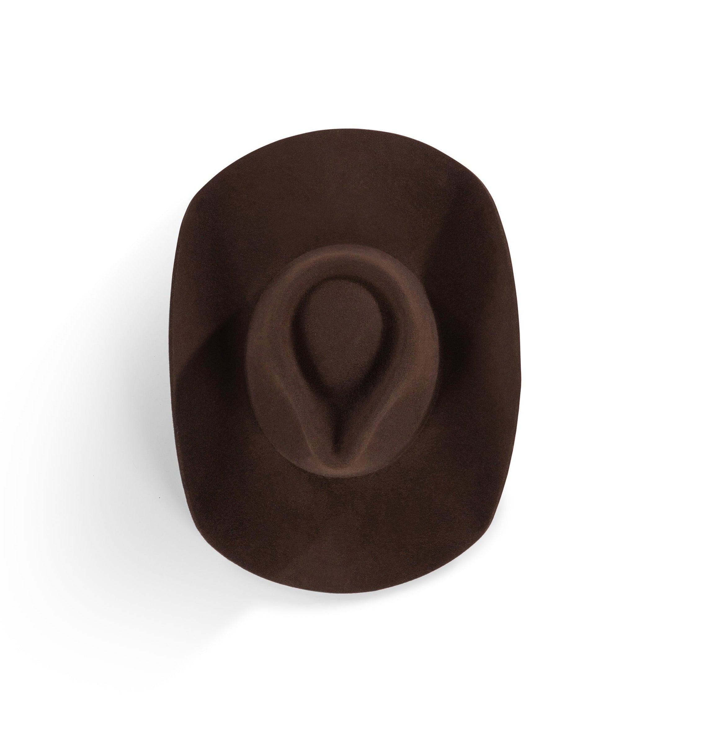 The Rodeo Smokey Brown Cowboy Hat is a fedora hat with western vibes. Channel your inner cowboy with this traditional cowboy hat. The Cowboy Hat is the perfect hat to wear to channel western vibes. The Rodeo Collection is perfect to channel your western vibes at a music festival in the warm sunshine.