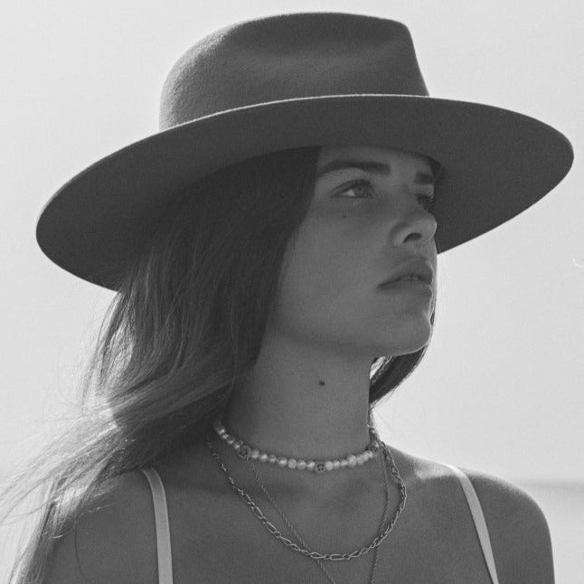 The Iconic Dizzle Desert. Beige fedora hat. Fedora Hat. Premium Quality Hat. Neutral hats. Timeless hat. Premium quality hats. Neutral hats. Beige hat.