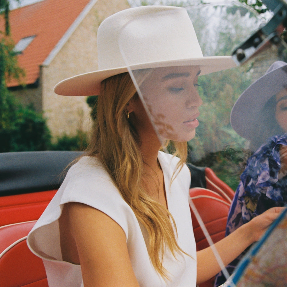 The Iconic Vintage White fedora Hat, white wool hat styles, bridal hats, Fedora Hat Styles. White hat. white fedora hat. timeless hat. timeless hat designs. woman with hat. wool hat.