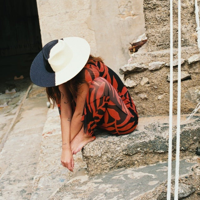 The Straw Iconic Limited Eclipse. Straw hat. Straw hat styles. Summer hat style. Summer hat. Summer hat styles. Black and white hat. Duo tone black and white hat. Duo-tone hat style. unique hat. statement hat. Unique Hat designs. Unique hat styles. Statement Hat. Statement hat Styles